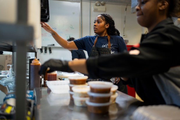 Kristen Harper works in the kitchen of her restaurant, Cleo's Southern Cuisine, in Bronzeville on Jan. 7, 2024. (Brian Cassella/Chicago Tribune)
