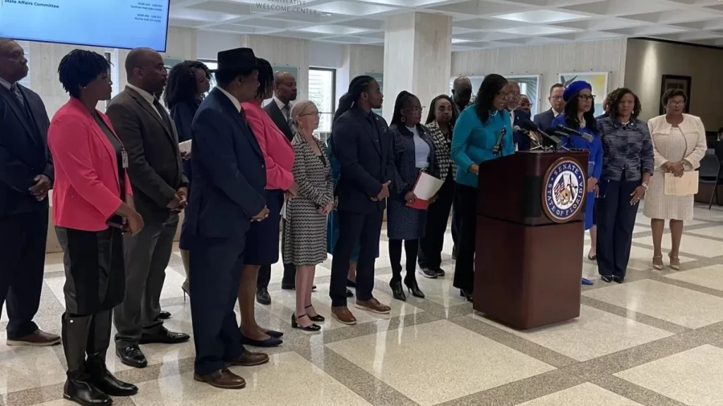 Black lawmakers protest the attorney general's stance on affirmative action.