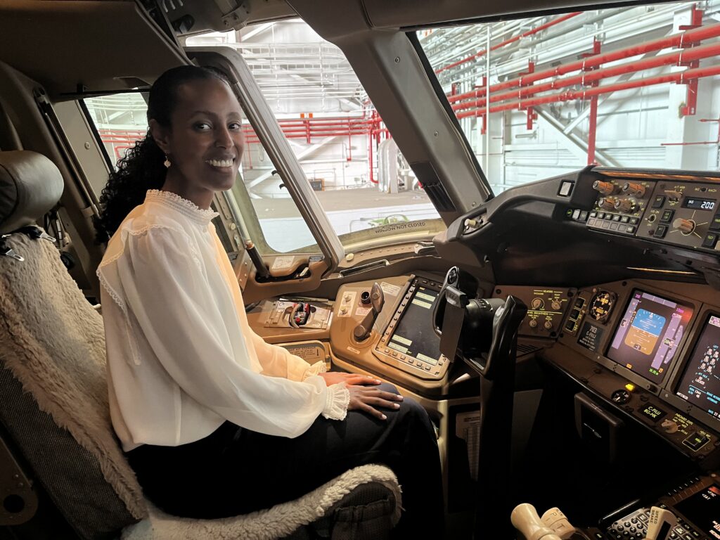 Dr. Wintta Ghebreiyesus sitting in one of her autonomous vehicles.